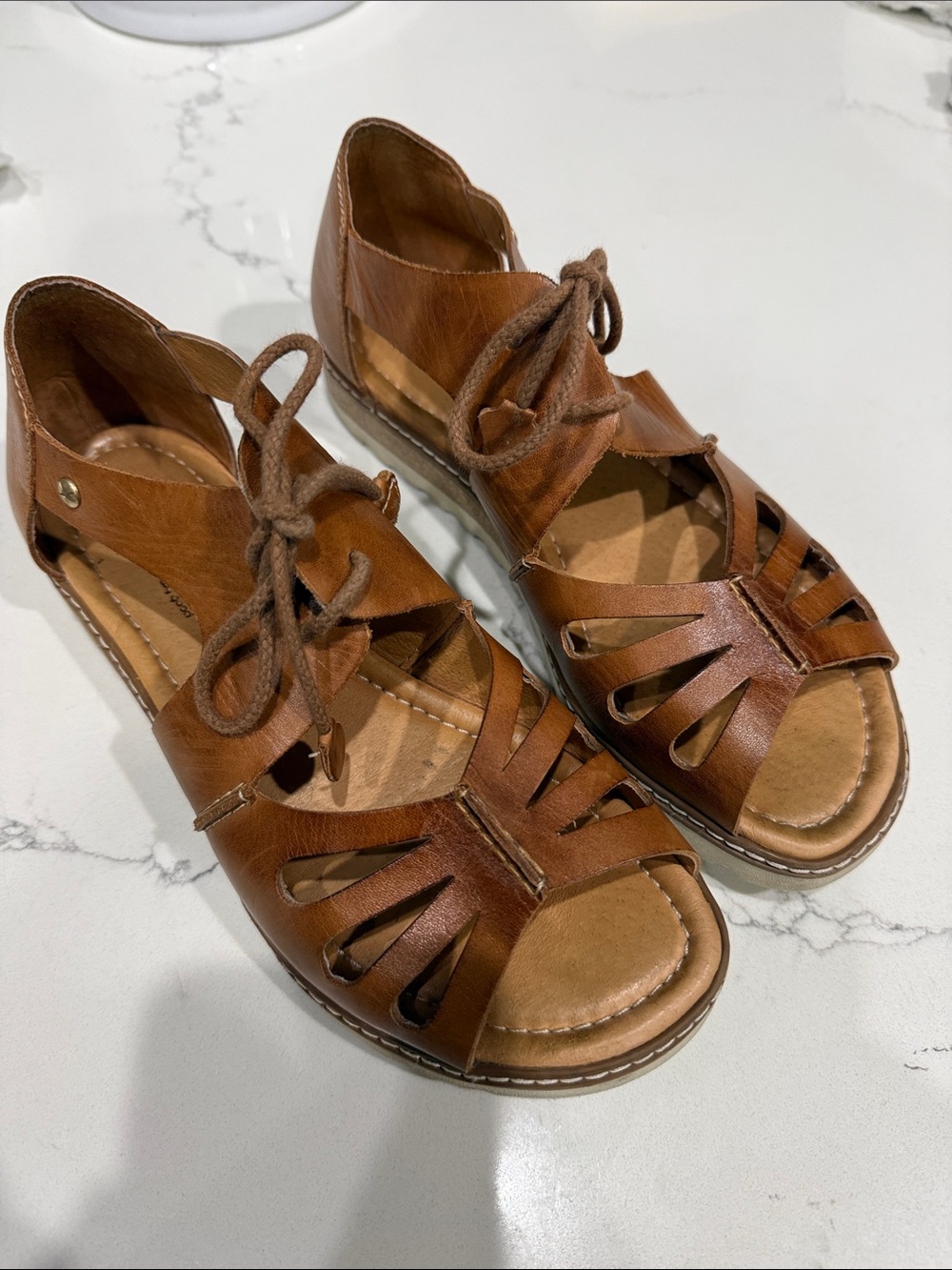 Women’s size 37  or 7 Pikolinos sandals.